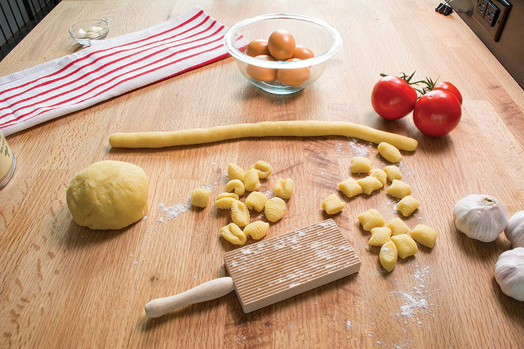 italian gnocchi board with fresh gnocchi on a countertop 