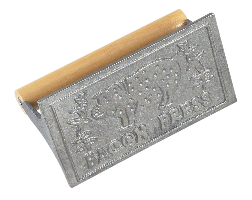 cast iron bacon press with wood handle and pig stamped on it