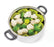 silicone vegetable steamer holding vegetables in a cooking pot