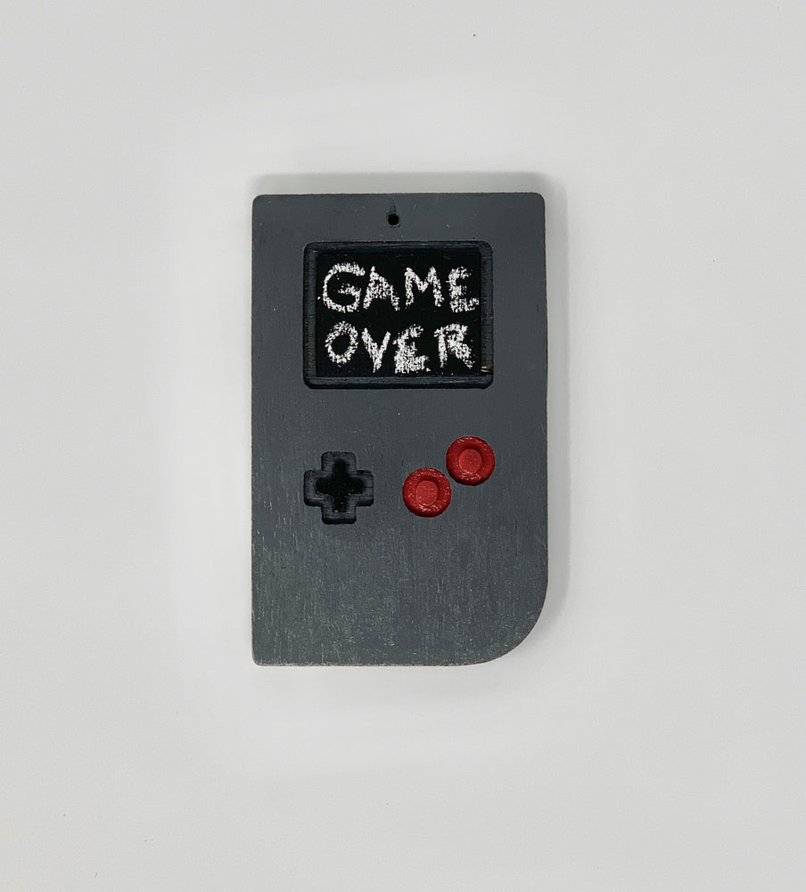 gameboy christmas tree ornament with the words game over on the front